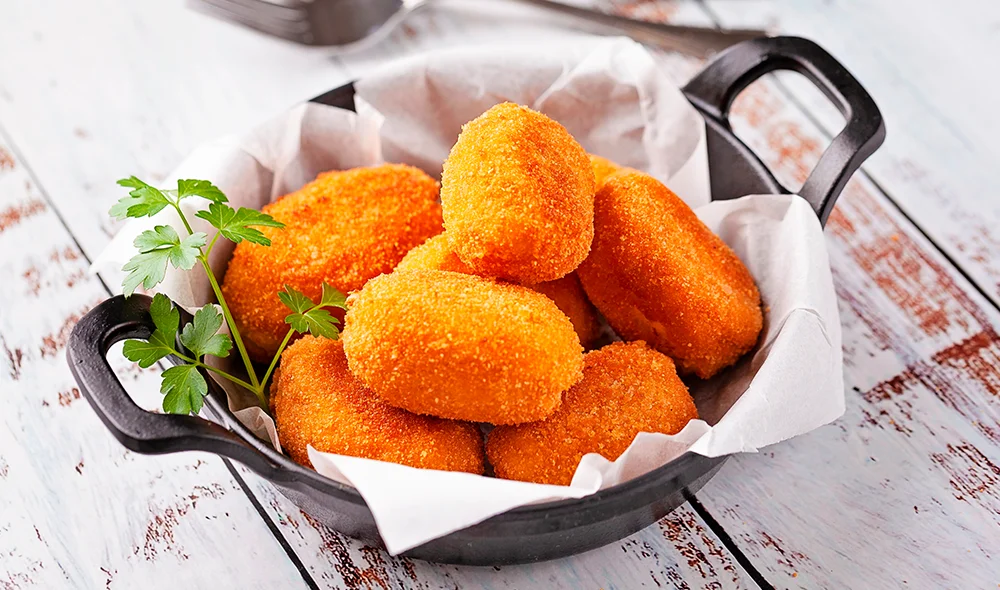 ¡Celebremos el Día de la Croqueta con un toque latino!