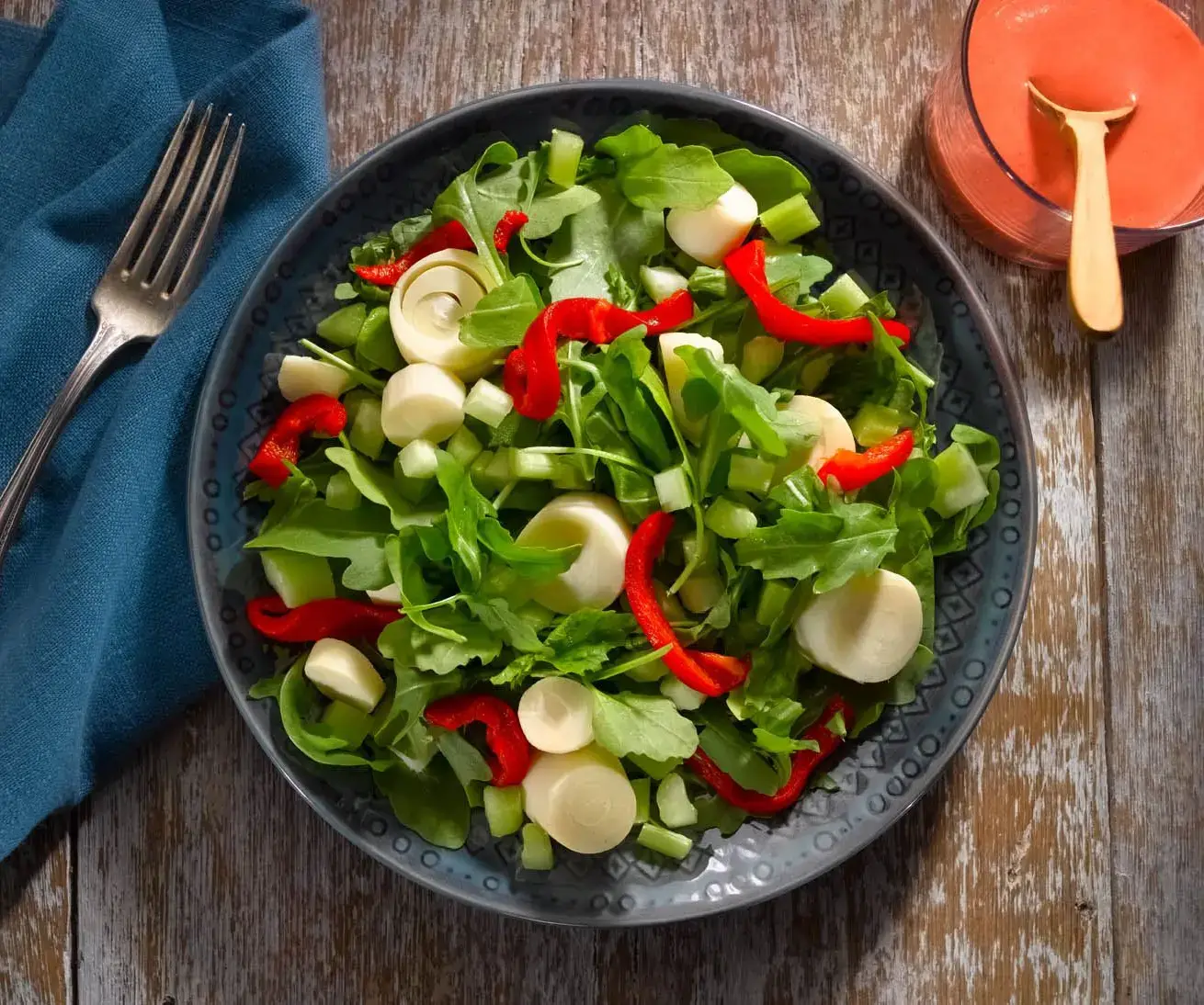 Ensalada de palmitos y arúgula con vinagreta de fresa